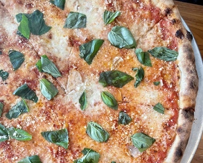 pizza with a mix of fresh and low moisture mozzarella