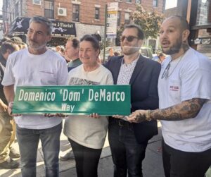 Mark Iacono, Margaret Mieles, Scott Wiener, and Frank Pinello celebrate with a street sign